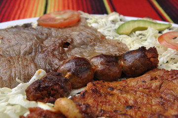 Grilled beef and sausage