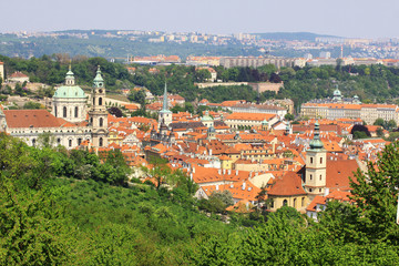 Obraz premium Spring Prague St. Nicholas' Cathedral with the green Nature