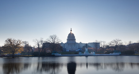 Sunrise behind the dome of the Capitol in DC
