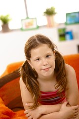 Cute little girl on couch