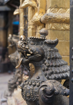 Brass lions at Swayambhunath