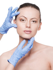 Beautician touch and exam health woman face