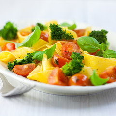 Pappardelle pasta with cherry tomato,capers and broccoli