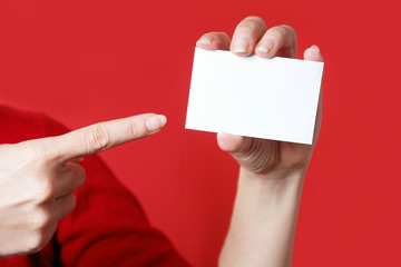 Hands with business card