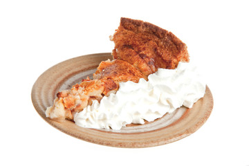 Grandma's homemade apple pie served with cream