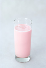 Strawberry dairy cocktail isolated on white background.