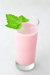 Strawberry dairy cocktail isolated on white background.