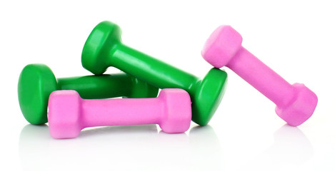 Pink and Green Dumbbells on the white background