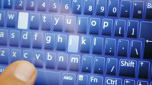 keyboard on tablet pc touch scrren and male hand typing
