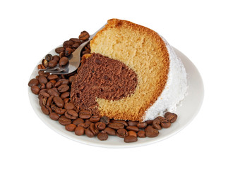 Slice of biscuit cake on coffee seed