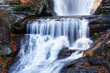 Fototapeta na wymiar Autumn Waterfall in mountain