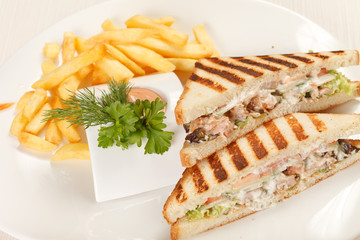 Sandwiches with French fried potatoes