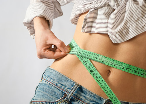 female waist being measured