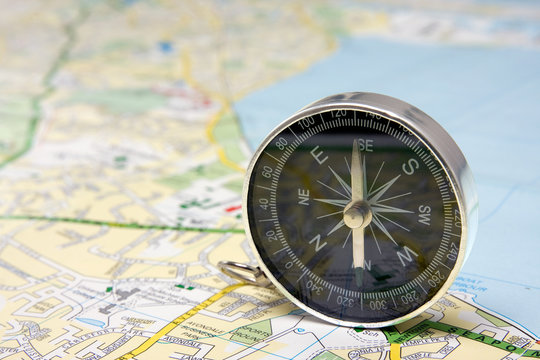 black compass on Dublin city map background.
