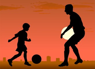 soccer players against sity sunset