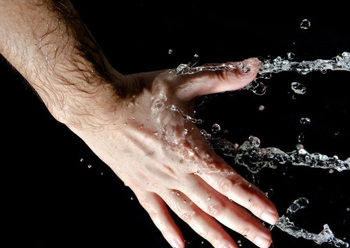 Hand and splashing water