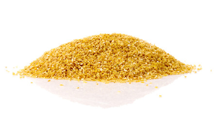 Fine-ground barley in pile isolated on white