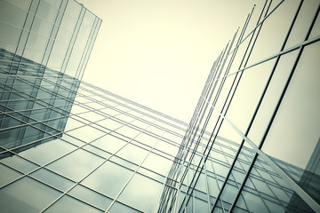 Obraz premium white texture of glass transparent skyscrapers at night