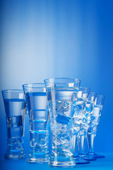 Water in the glass against gradient background