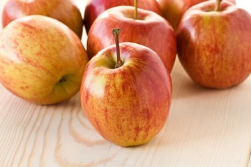 Apples on a wooden board