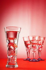 Water in the glass against gradient background