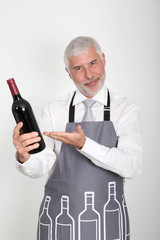 Wine waiter standing on white background