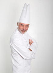 Senior chef with arms crossed