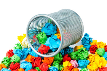 Garbage bin with paper waste isolated on white