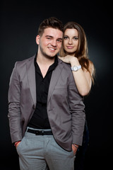 happy young boy and girl standing