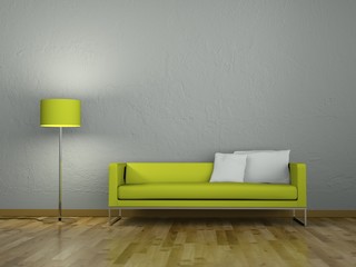 Grünes Sofa vor grauer Wand