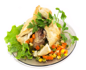 Chicken leg, baked in pastry with vegetables