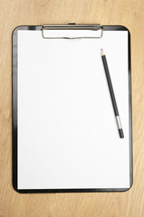 Clipboard and pencil