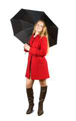 Woman in red coat with umbrella