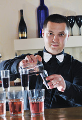pro barman prepare coctail drink on party