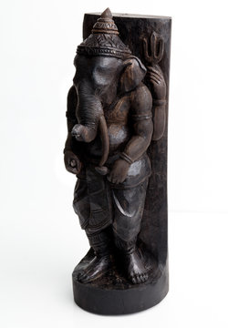 Ebony wood Ganesha God of success isolated white background