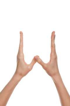 female Hands froming the letter "W"