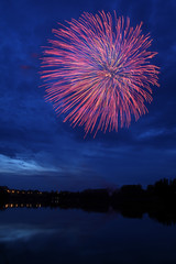 Fireworks Over Lake at Night