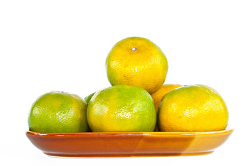 orange fruit On the dish.
