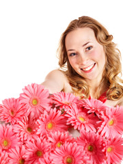 Happy young woman holding flowers.