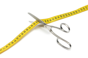 Scissors cutting a measuring isolated - obrazy, fototapety, plakaty