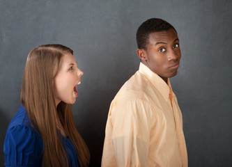 Man Ignores Angry Woman