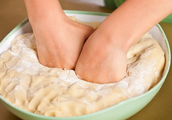 Little boy hands kneading