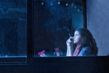 Girl is relaxing in a coffee house