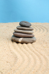 Fototapeta na wymiar Zen stone in the sand