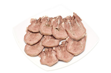sliced neat tongue served with mustard and horseradish