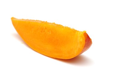 Fototapeta na wymiar Fresh mango slice isolated on white