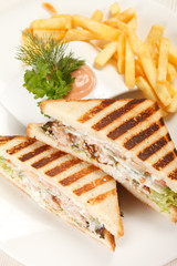 Sandwiches with French fried potatoes