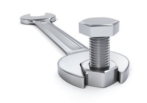 Wrench fixing nut and bolt - isolated