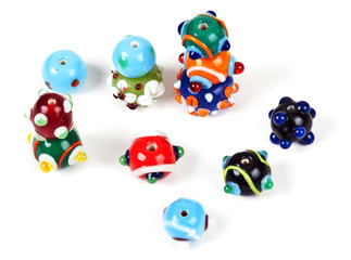 Fototapeta na wymiar colored glass beads hand