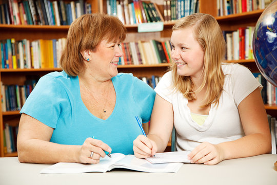 Mother Or Teacher With Teen Student